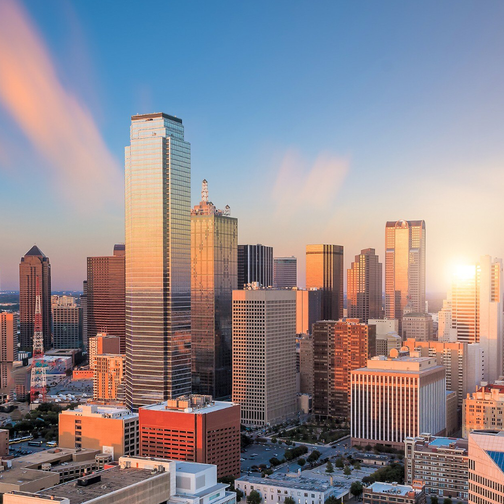 Downtown Dallas skyline at sunset – managed IT services in Dallas, Texas