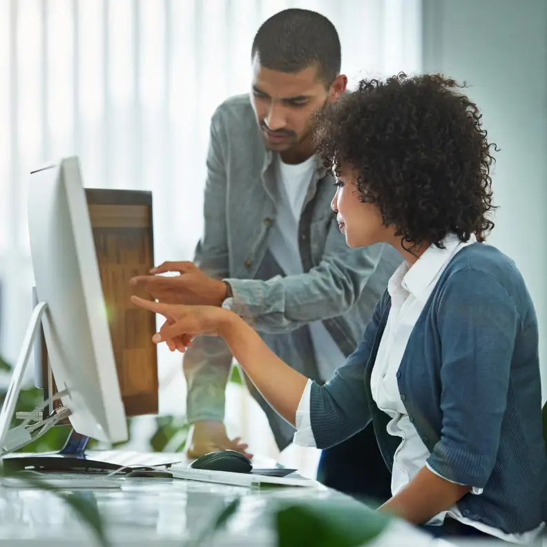 IT professionals collaborating in a modern Austin office – managed IT services